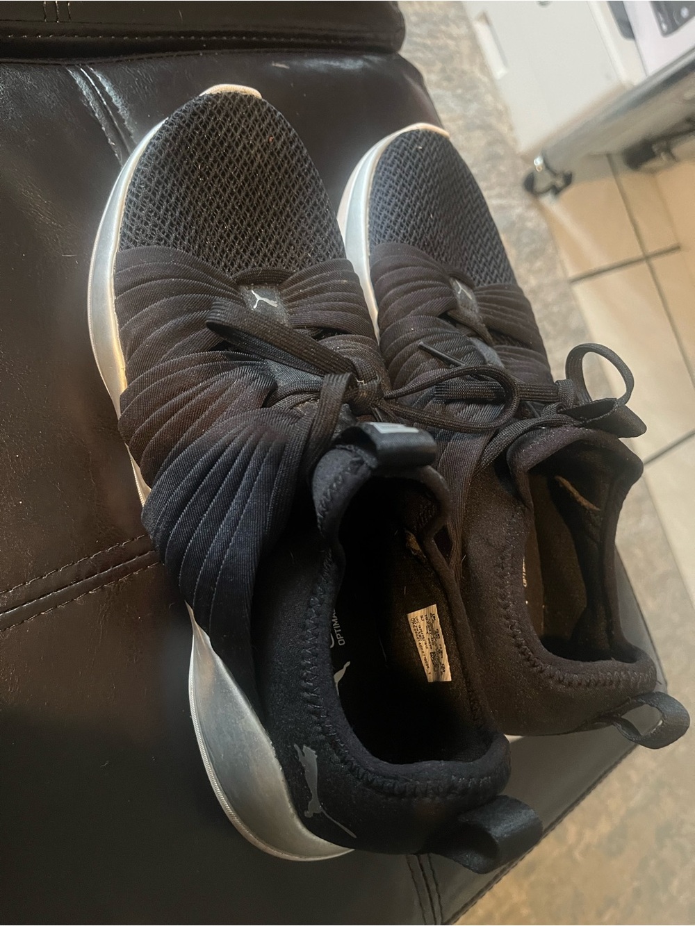 Puma Black and Silver Knit Slip-On Sneakers